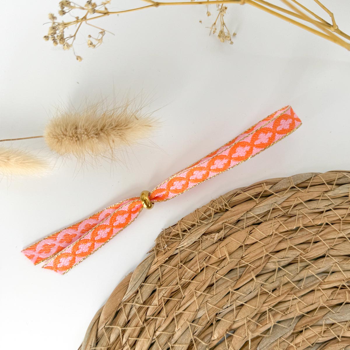 ibiza armband oranje roze lint